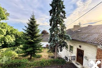 Ruhiges Wohnen Nahe Ortszentrum - Haus sanierungsbedürftig mit Potenzial !