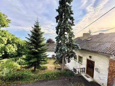 Ruhiges Wohnen Nahe Ortszentrum - Haus sanierungsbedürftig mit Potenzial !